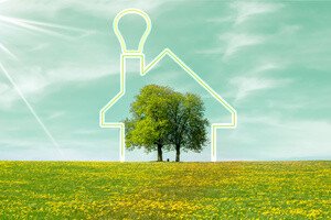 Bauturbo - Grafik von Wiese mit Baum eingerahmt von einem Hausumriss mit Glühlampe als Schornstein