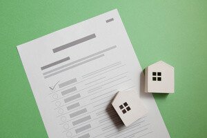 Grundpartner Erbbaurecht - Modellhäuser auf Zettel