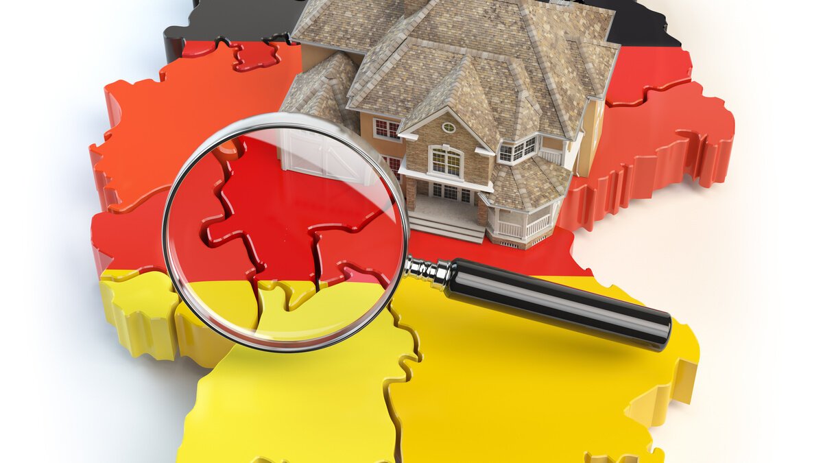 Lastenausgleichsgesetz - Grafik Deutschland mit Haus und Lupe